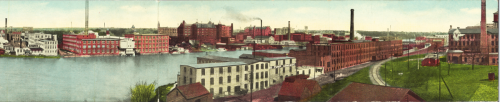 The W.F. and John Barnes Company factory building on the east bank of the Rock River. The factory is the red building with the smoke stack on the center right