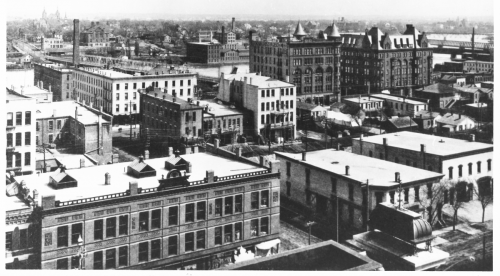 The Nelson Hotel, to the right of the Brown Building, dominates Rockford’s west side at the turn of the 20th century.